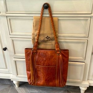 Patricia Nash tasseled tooled leather handbag with dust bag